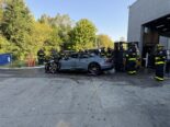 audi e-tron gt geht in flammen auf – feuerwehr löscht vor dem autohaus